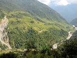 
Trail Towards Chomrong Across The Valley From Chiule With Khumnu Khola Below On The Way From Ghorepani To Chomrong
